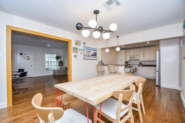 dining room featuring dark hardwood / wood-style floors