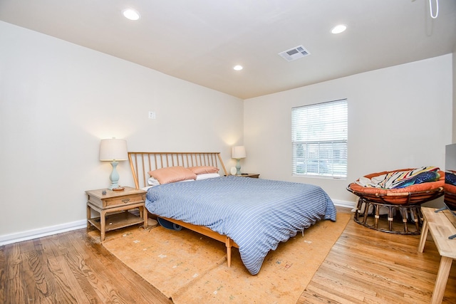 bedroom featuring light hardwood / wood-style flooring