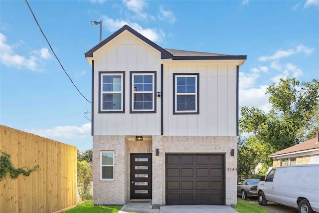 view of front of home with a garage