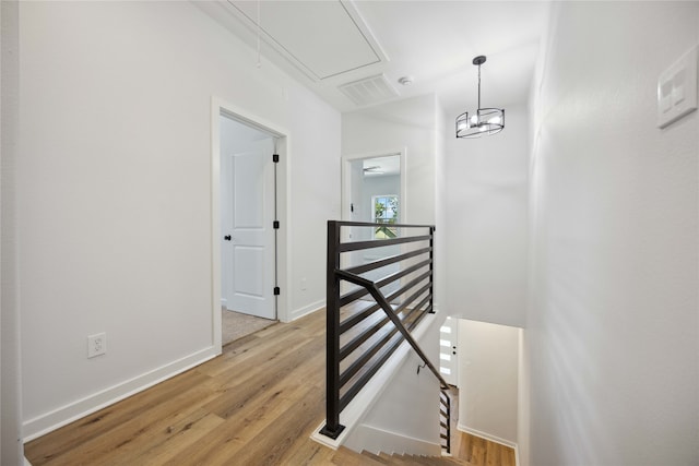 corridor featuring light hardwood / wood-style flooring