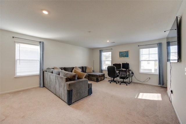 living room featuring light colored carpet