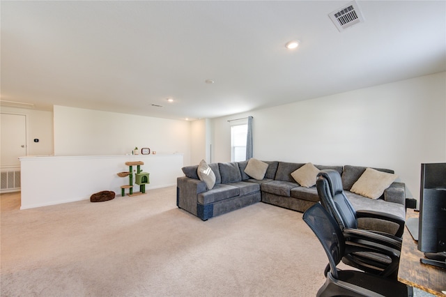 living room featuring light colored carpet