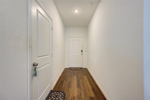 hall featuring dark hardwood / wood-style flooring