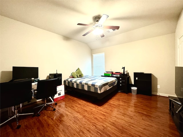 bedroom featuring wood-type flooring, ceiling fan, and vaulted ceiling