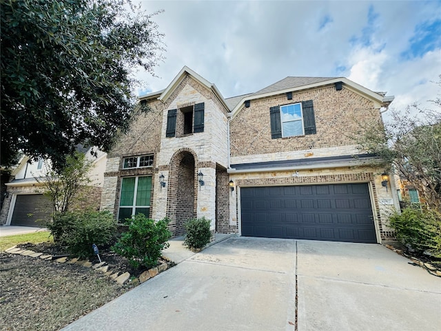 view of front of property featuring a garage