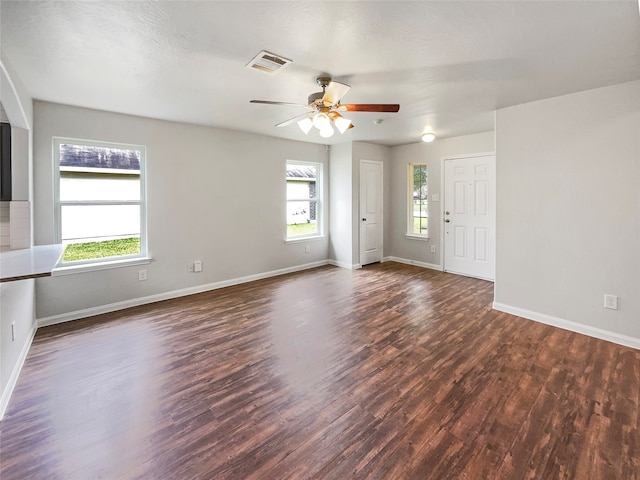 interior space featuring dark hardwood / wood-style flooring and ceiling fan