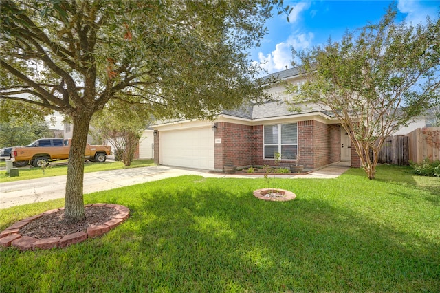 view of front of house featuring a garage and a front yard