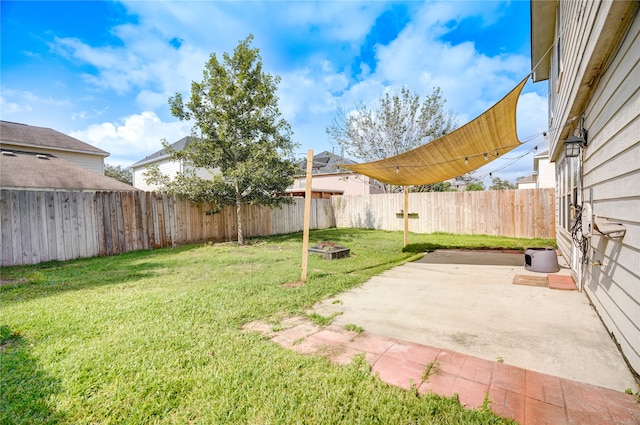 view of yard with a patio area