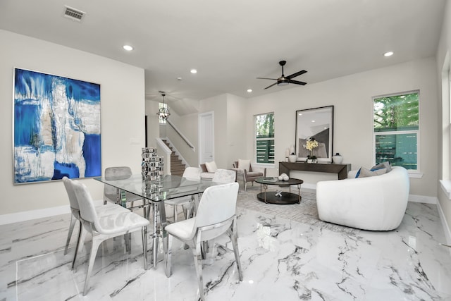 dining area with ceiling fan and plenty of natural light