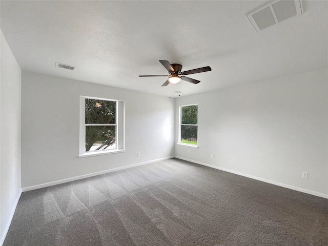 carpeted empty room with ceiling fan