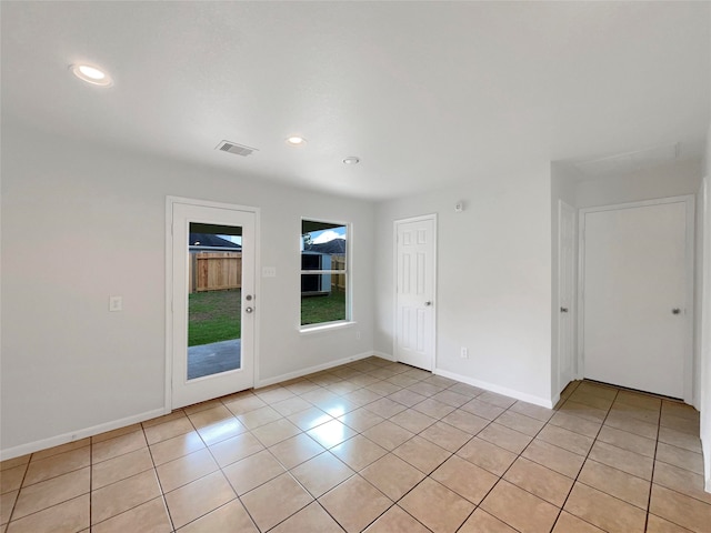 view of tiled spare room