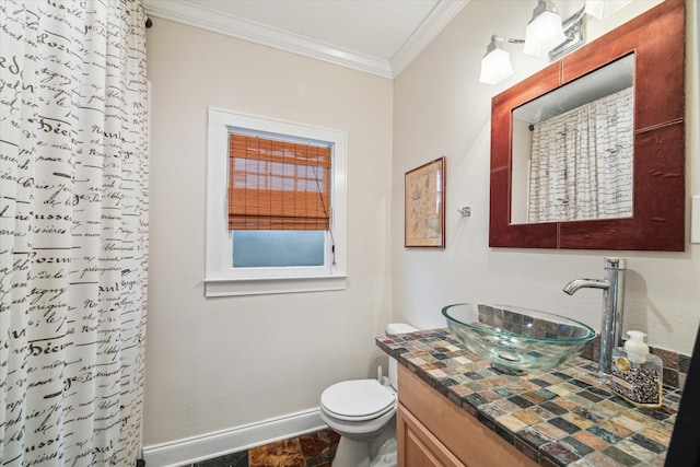 bathroom featuring toilet, walk in shower, vanity, and ornamental molding