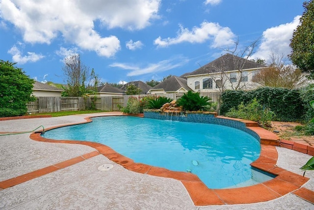 view of swimming pool featuring a patio and pool water feature