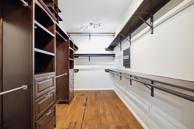 spacious closet with light wood-type flooring