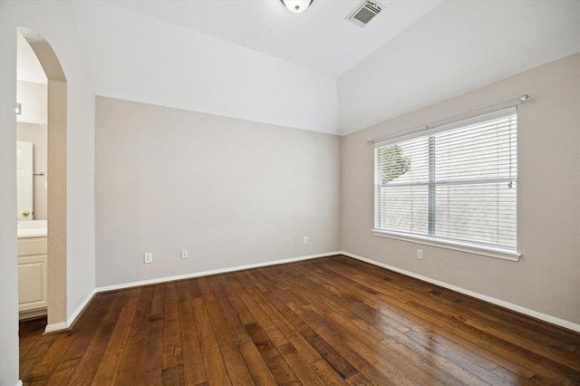 empty room featuring dark hardwood / wood-style floors