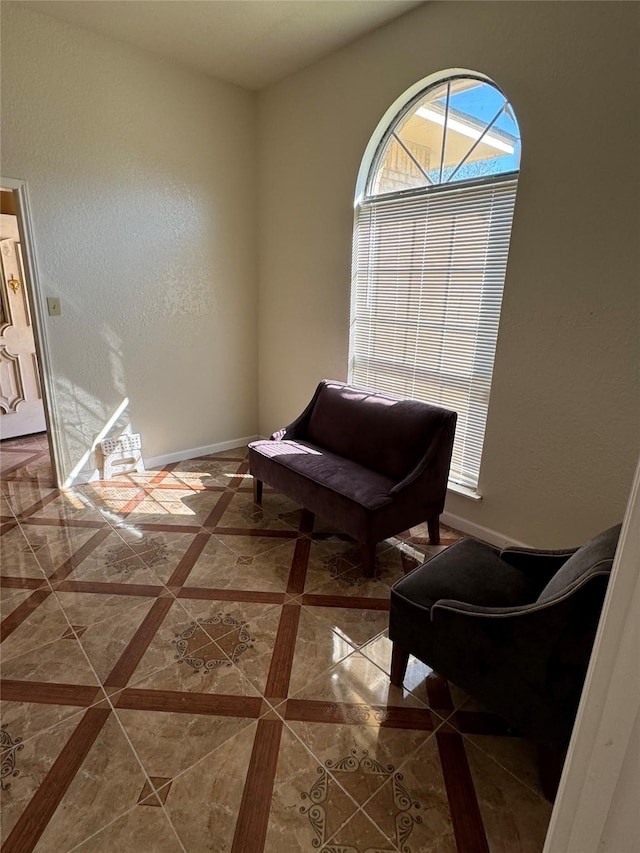 unfurnished room featuring tile patterned flooring