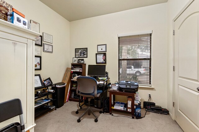 office space with light colored carpet