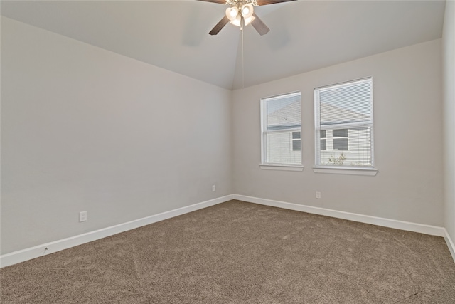 unfurnished room with carpet, lofted ceiling, and ceiling fan