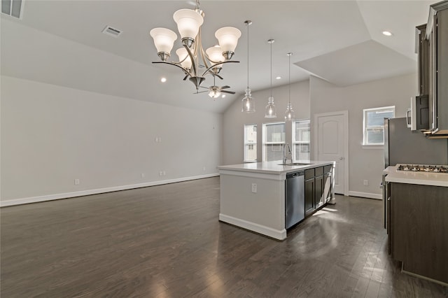 kitchen featuring a kitchen island with sink, stainless steel appliances, dark wood-type flooring, and decorative light fixtures