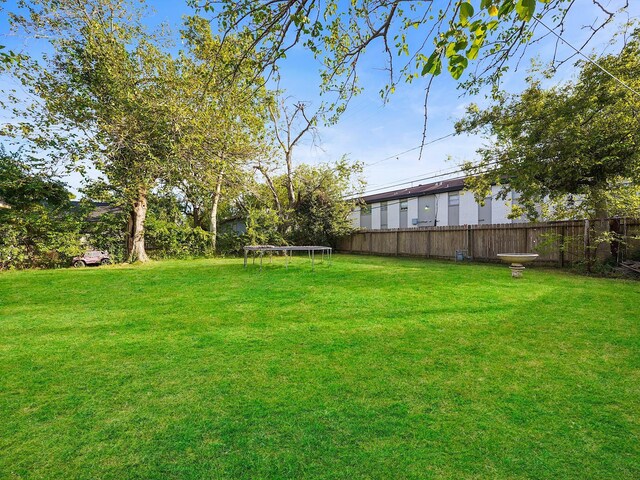 3120 Redfield Dr, Pasadena, TX 77503 - view of yard with a trampoline
