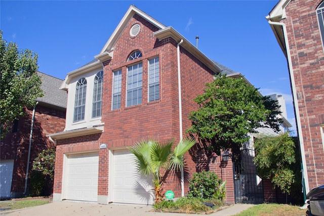 view of side of property with a garage