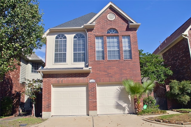 front of property with a garage