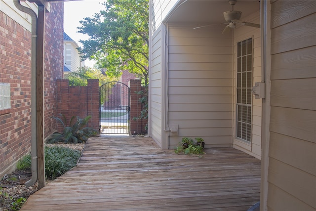 wooden deck with ceiling fan