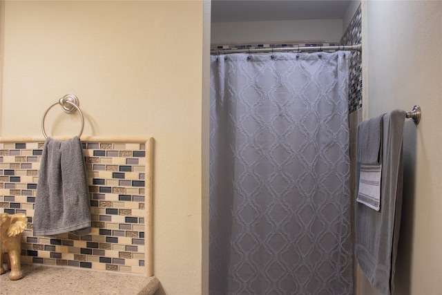 bathroom featuring walk in shower