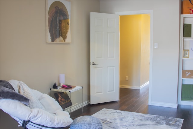 bedroom featuring dark hardwood / wood-style flooring