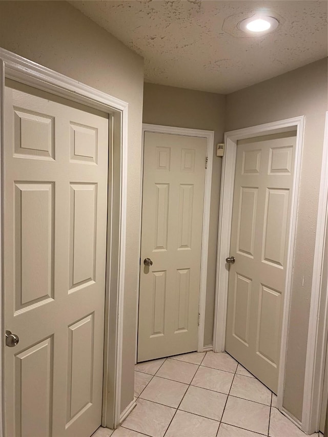 16703 Sentinel Dr, Houston, TX 77053 - hallway featuring light tile patterned floors