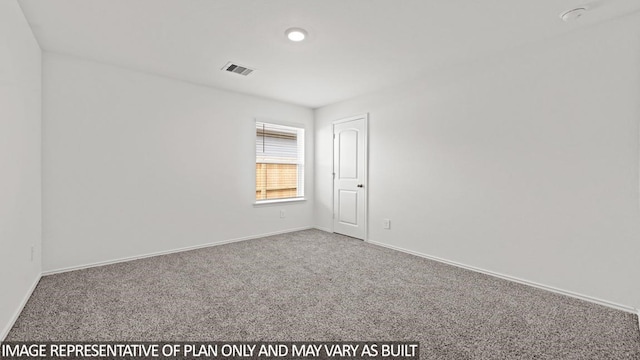 empty room featuring carpet floors