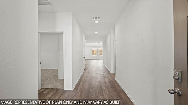 hall with dark hardwood / wood-style flooring