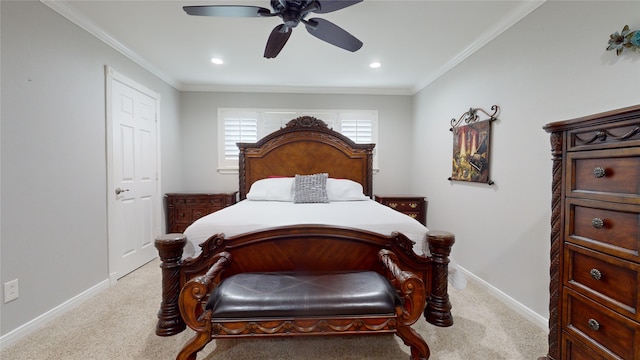 bedroom featuring ceiling fan, light carpet, and crown molding