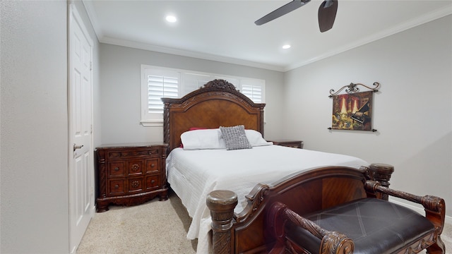 bedroom with light carpet, ceiling fan, and crown molding