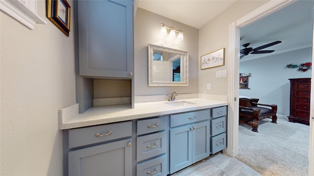 bathroom featuring ceiling fan and vanity