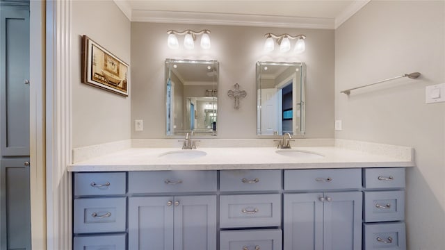 bathroom featuring vanity and crown molding