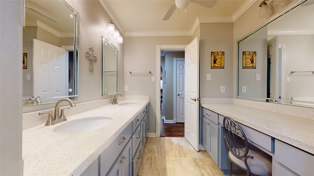 bathroom with hardwood / wood-style flooring, ceiling fan, vanity, and crown molding