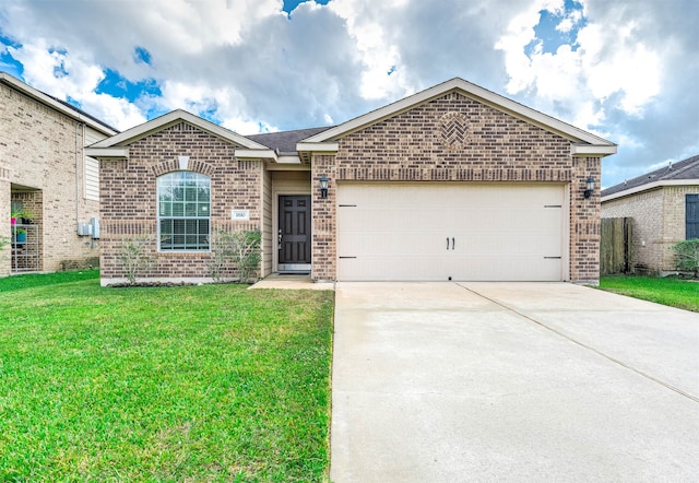 view of front facade featuring a garage and a front yard