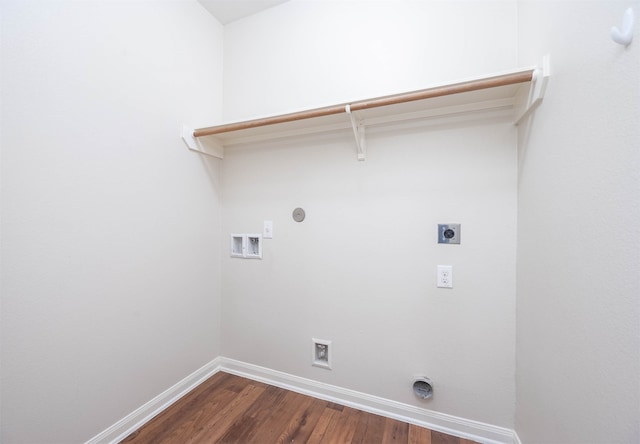 clothes washing area featuring hookup for an electric dryer, hookup for a washing machine, hardwood / wood-style flooring, and hookup for a gas dryer