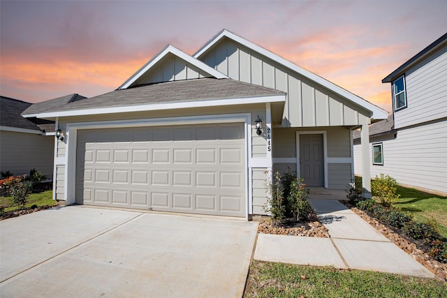 view of front of property with a garage