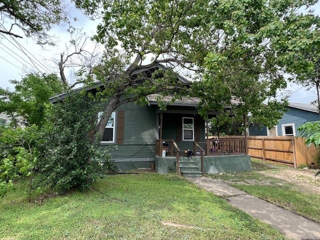 bungalow with a front yard