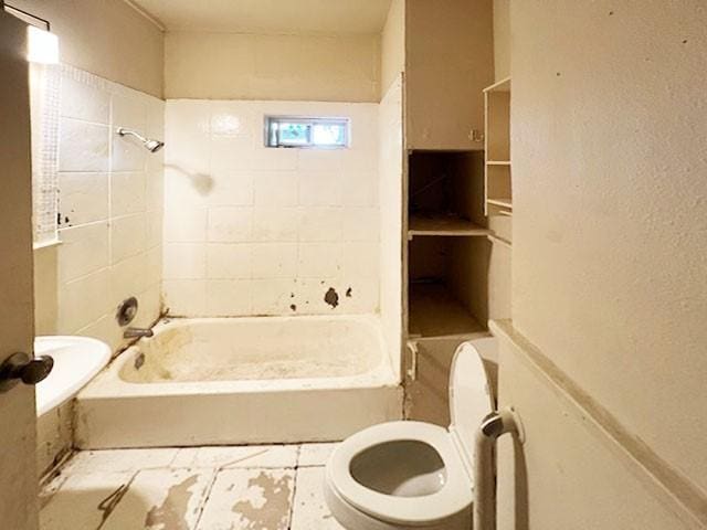2251 Burnet St, San Antonio, TX 78202 - bathroom featuring toilet and  shower combination