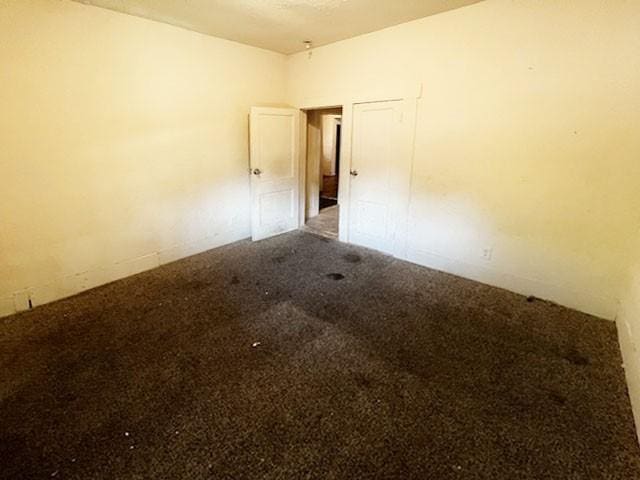 2251 Burnet St, San Antonio, TX 78202 - spare room with carpet