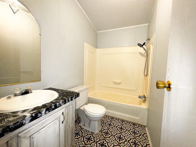 full bathroom with ornamental molding, vanity, a textured ceiling, tub / shower combination, and toilet