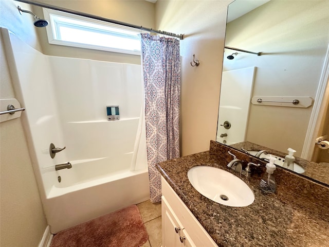 bathroom featuring tile patterned floors, vanity, and shower / bath combo with shower curtain