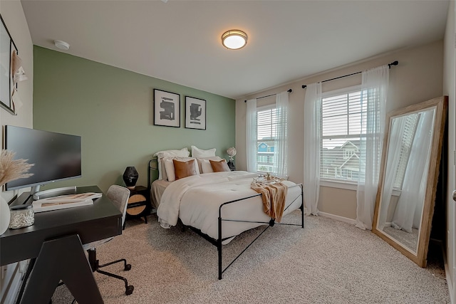 7659 Green Bulrush Way, Katy, TX 77493 - bedroom featuring light colored carpet, a desk, and baseboards