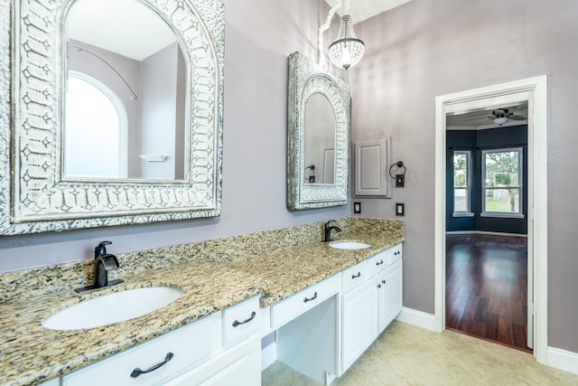 bathroom with vanity, ceiling fan, and tile patterned floors