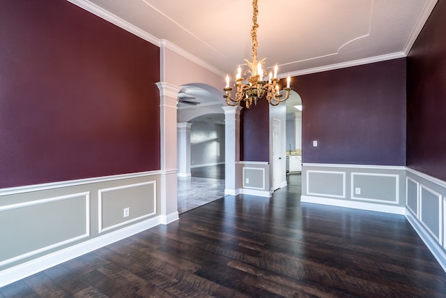 unfurnished dining area featuring crown molding, dark hardwood / wood-style flooring, and ornate columns