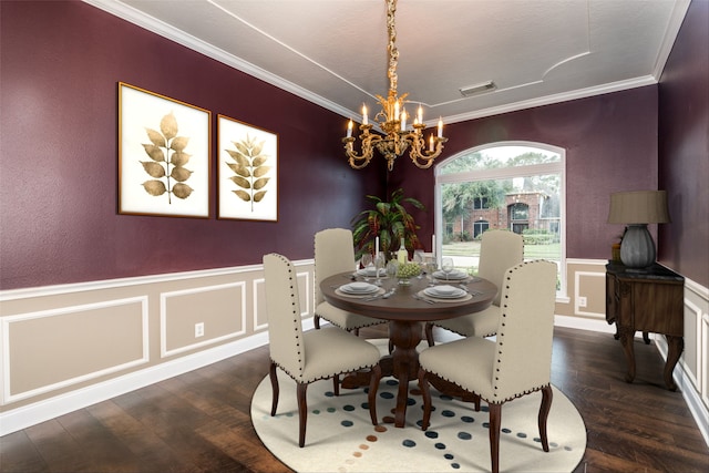 dining space with dark wood-type flooring, crown molding, and a notable chandelier