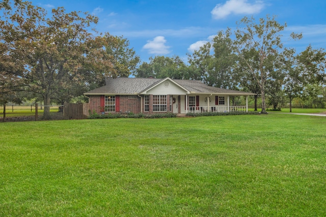 single story home featuring a front yard and a porch